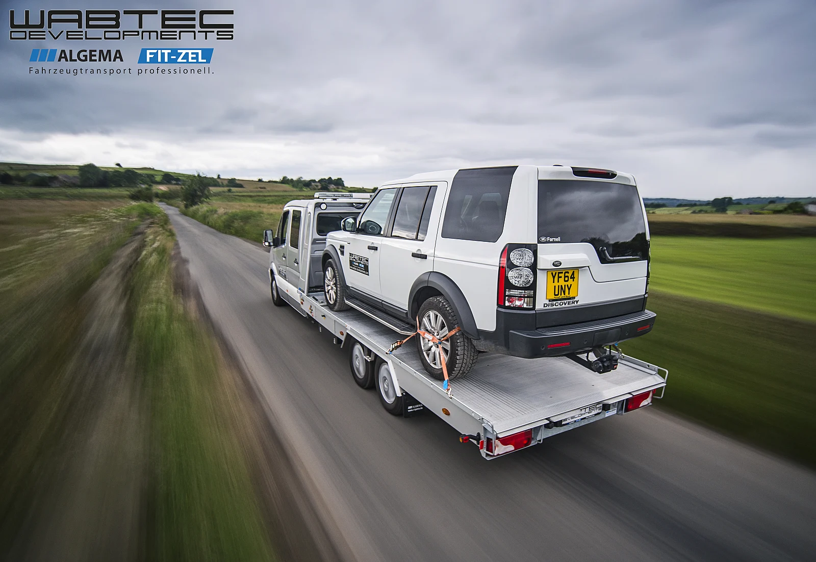 Algema Blitzlader car transporter carrying a Land Rover Discovery